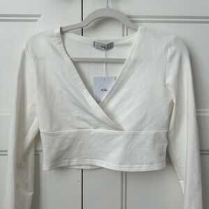 Adults white crossover top with tags, size S